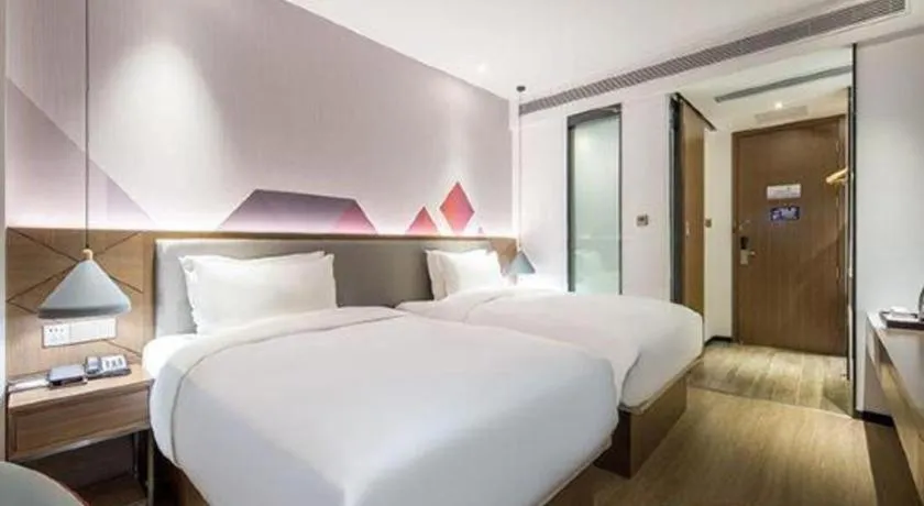 Bed in Borrman Hotel Wuzhou Teng County