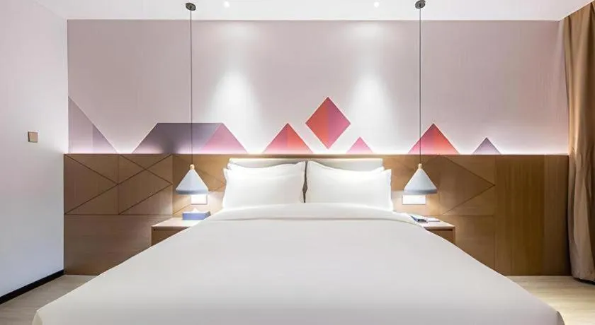 Bed in Borrman Hotel Wuzhou Teng County