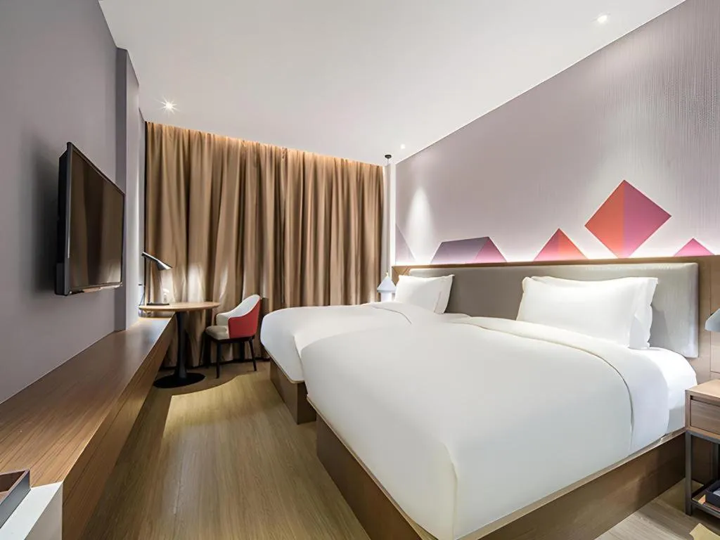 Bed in Borrman Hotel Wuzhou Teng County