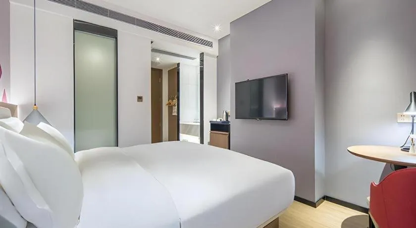 Bed in Borrman Hotel Wuzhou Teng County