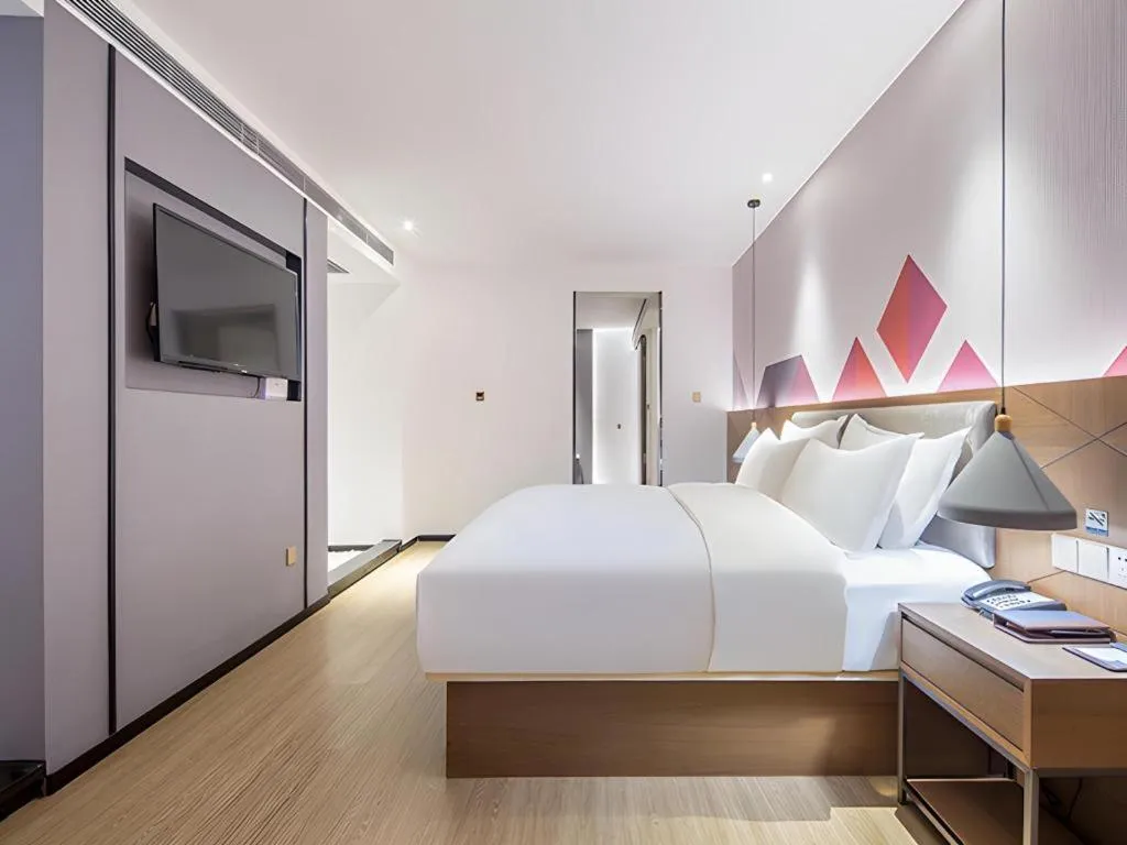 Bed in Borrman Hotel Wuzhou Teng County