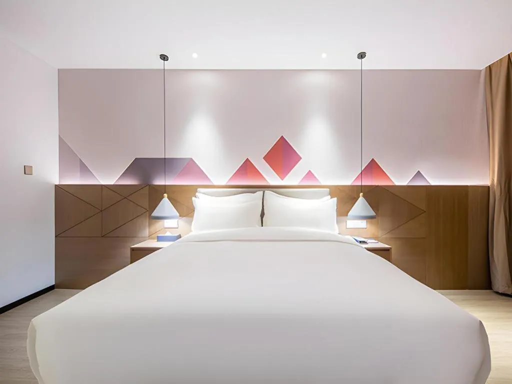 Bed in Borrman Hotel Wuzhou Teng County