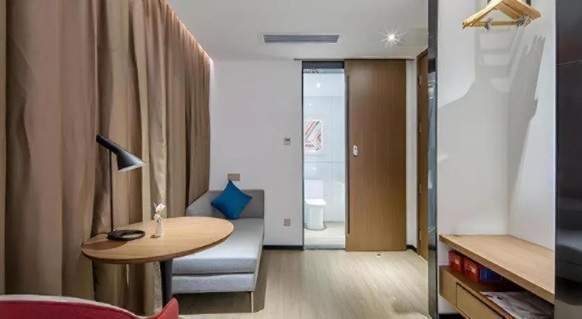 Bed in Borrman Hotel Wuzhou Teng County