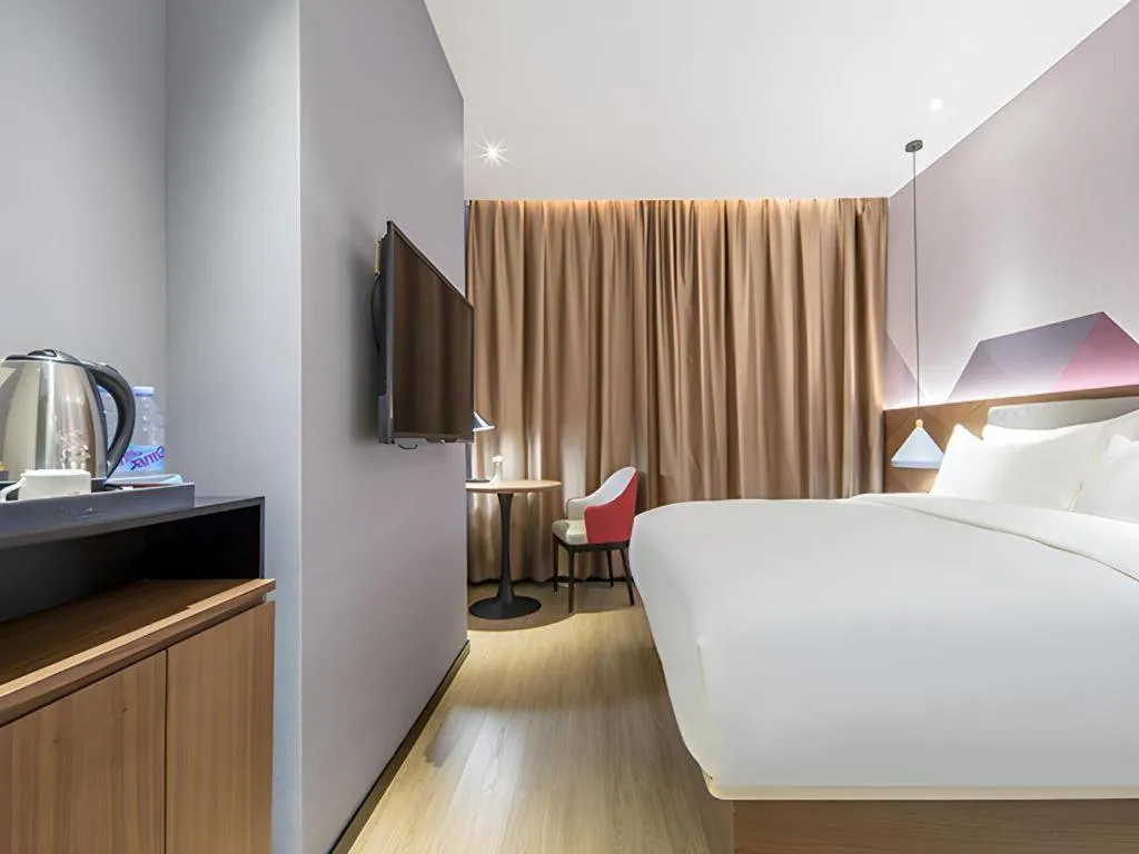 Bed in Borrman Hotel Wuzhou Teng County