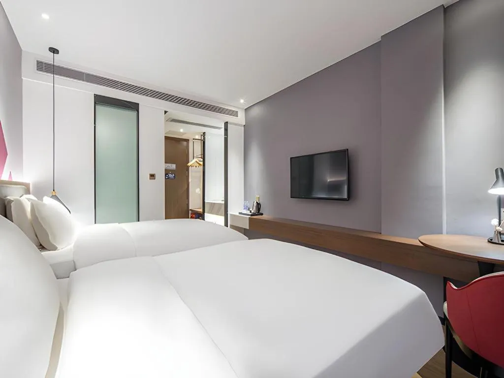 Bed in Borrman Hotel Wuzhou Teng County