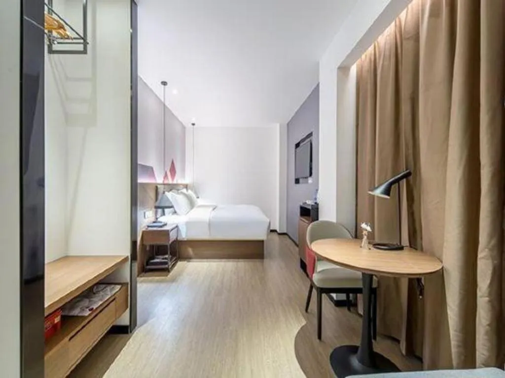 Bed in Borrman Hotel Wuzhou Teng County