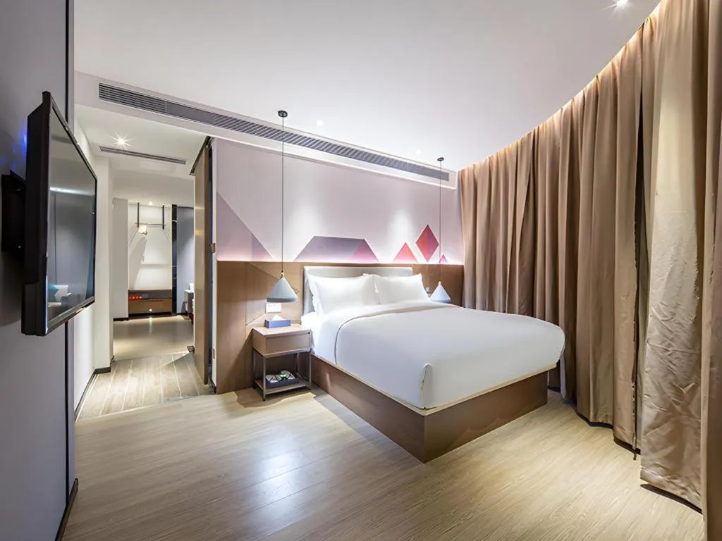 Bed in Borrman Hotel Wuzhou Teng County