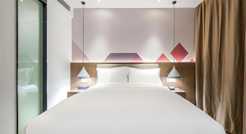 Bed in Borrman Hotel Wuzhou Teng County