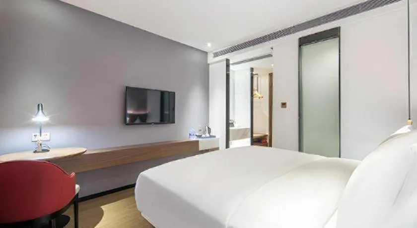 Bed in Borrman Hotel Wuzhou Teng County