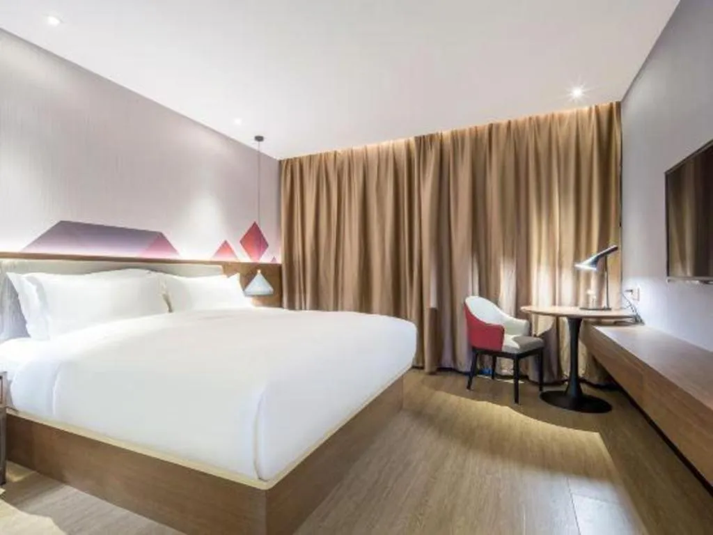 Bed in Borrman Hotel Wuzhou Teng County