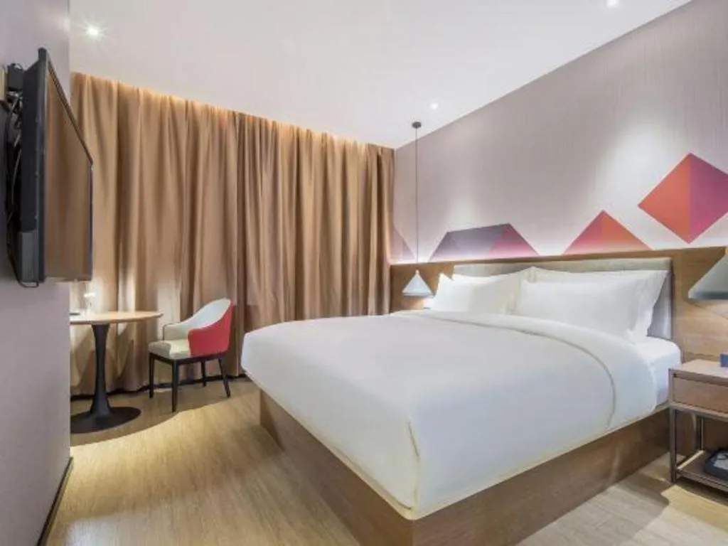 Bed in Borrman Hotel Wuzhou Teng County