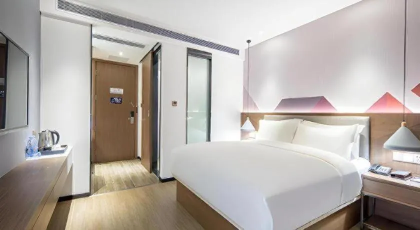 Bed in Borrman Hotel Wuzhou Teng County