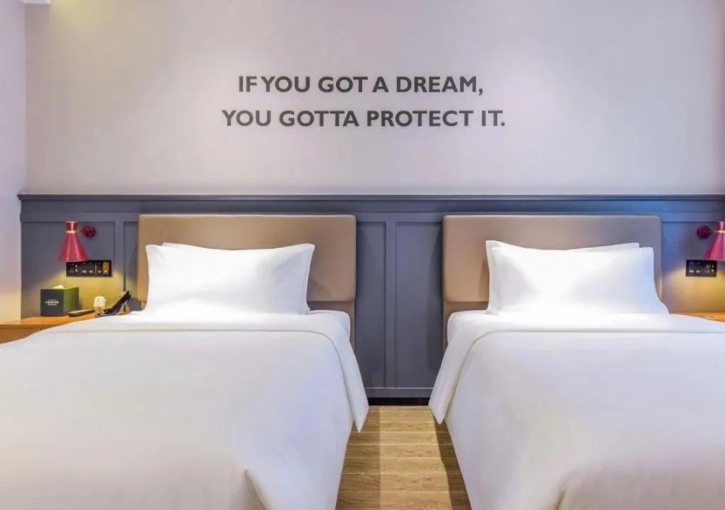 Bed in Premier City Comfort Hotel Wuhan Hankou Railway Station Changgang Road Metro Station