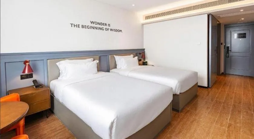 Bed in Premier City Comfort Hotel Wuhan Hankou Railway Station Changgang Road Metro Station