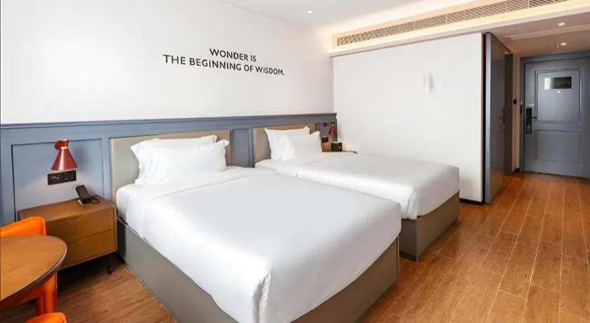 Bed in Premier City Comfort Hotel Wuhan Hankou Railway Station Changgang Road Metro Station