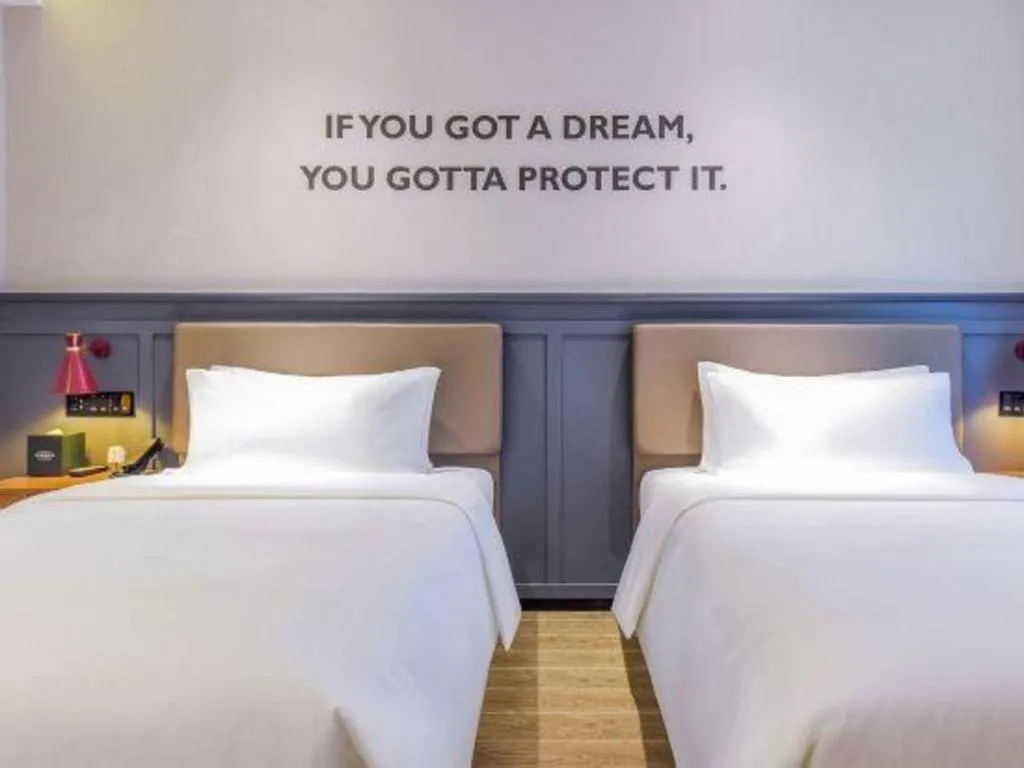 Bed in Premier City Comfort Hotel Wuhan Hankou Railway Station Changgang Road Metro Station