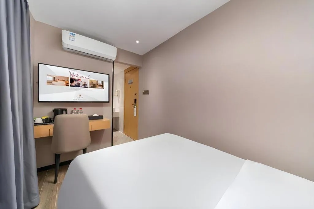 Bed in Borrman Hotel Guangzhou Shisanhang Ximenkou Metro Station