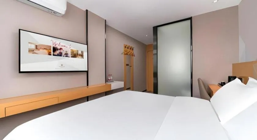 Bed in Borrman Hotel Guangzhou Shisanhang Ximenkou Metro Station