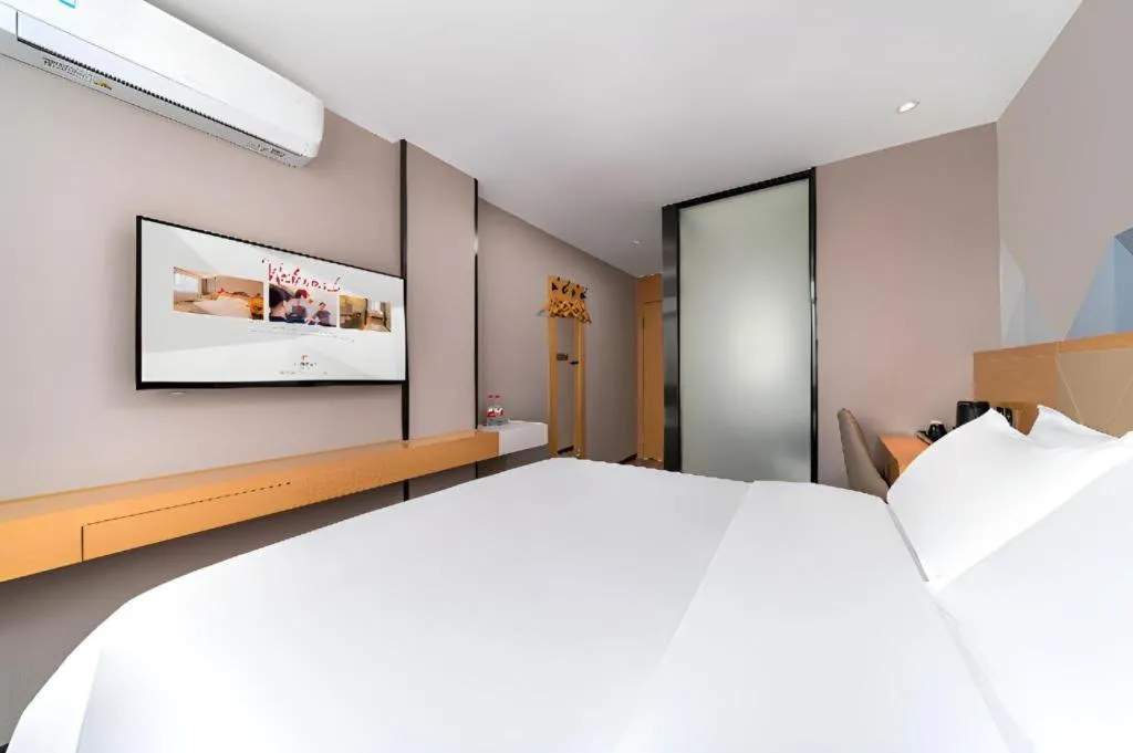 Bed in Borrman Hotel Guangzhou Shisanhang Ximenkou Metro Station