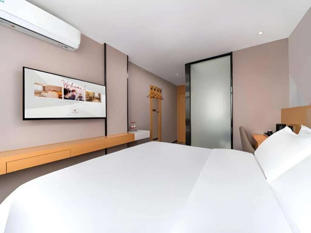 Bed in Borrman Hotel Guangzhou Shisanhang Ximenkou Metro Station