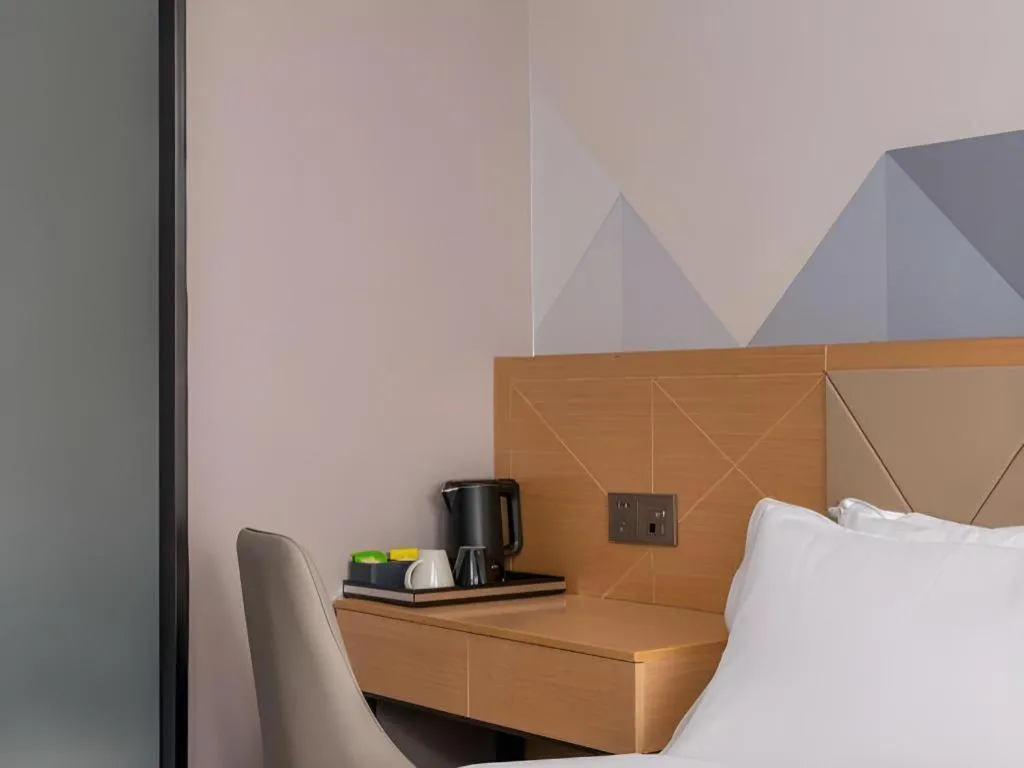 Bed in Borrman Hotel Guangzhou Shisanhang Ximenkou Metro Station