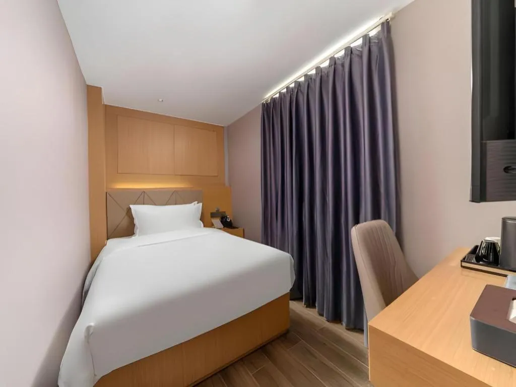 Bed in Borrman Hotel Guangzhou Shisanhang Ximenkou Metro Station