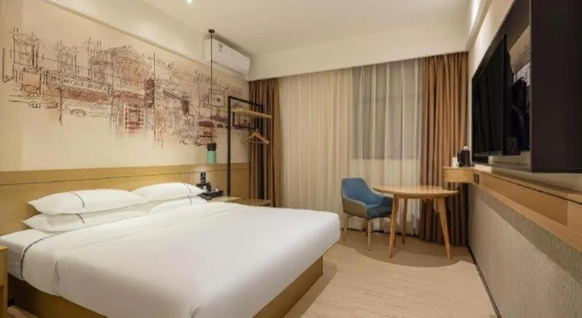 Bed in City Comfort Inn Liuzhou Liudong New District Hualing Youlinghui