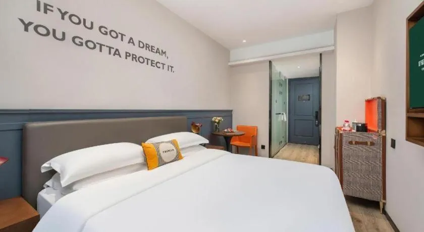 Bed in City Comfort Premier Hotel Liuzhou Wuxing Pedestrian Street Jinggu Building