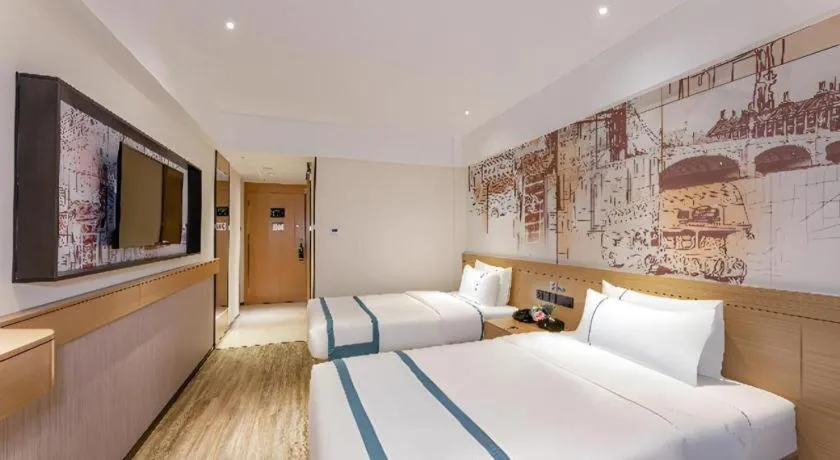 Bed in City Comfort Inn Yancheng Xihuan Road Wanda Plaza