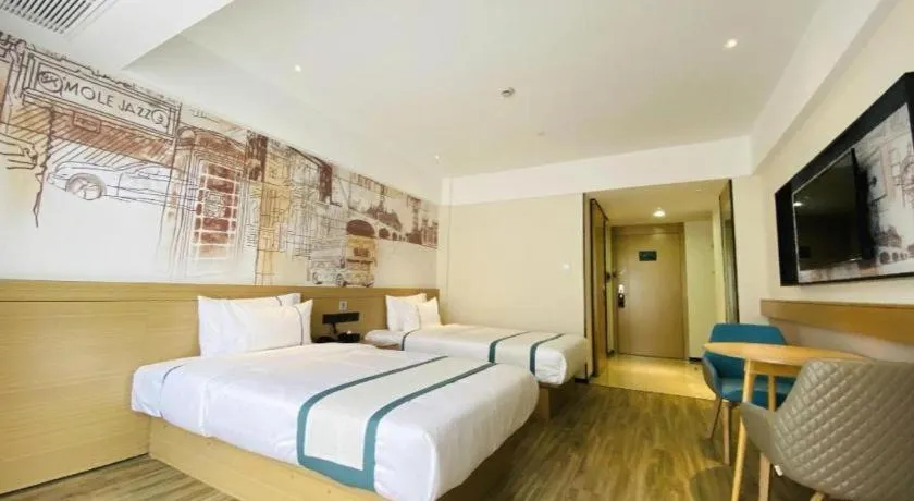 Bed in City Comfort Inn Yancheng Xihuan Road Wanda Plaza