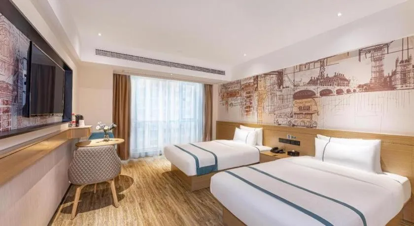 Bed in City Comfort Inn Yancheng Xihuan Road Wanda Plaza