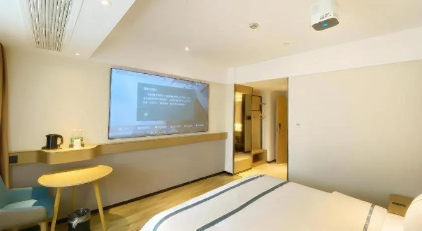 Bed in City Comfort Inn Yancheng Xihuan Road Wanda Plaza