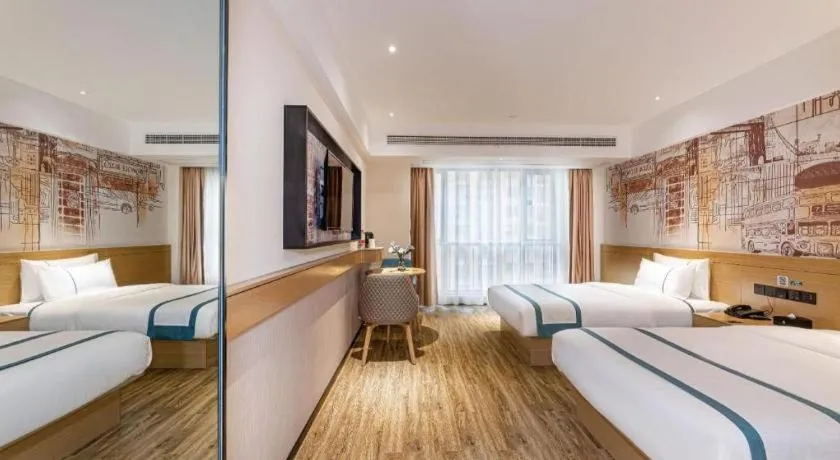 Bed in City Comfort Inn Yancheng Xihuan Road Wanda Plaza