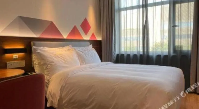 Bed in Borrman Hotel Beijing Tongzhou Universal Canal Business Zone