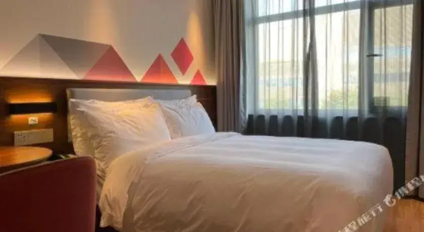 Bed in Borrman Hotel Beijing Tongzhou Universal Canal Business Zone Bed in Borrman Hotel Beijing Tongzhou Universal Canal Business Zone