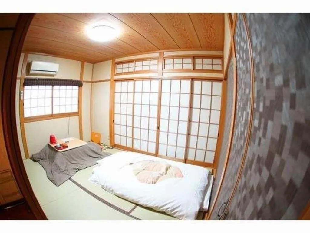 Bed in Hotel Miyoshino Annex