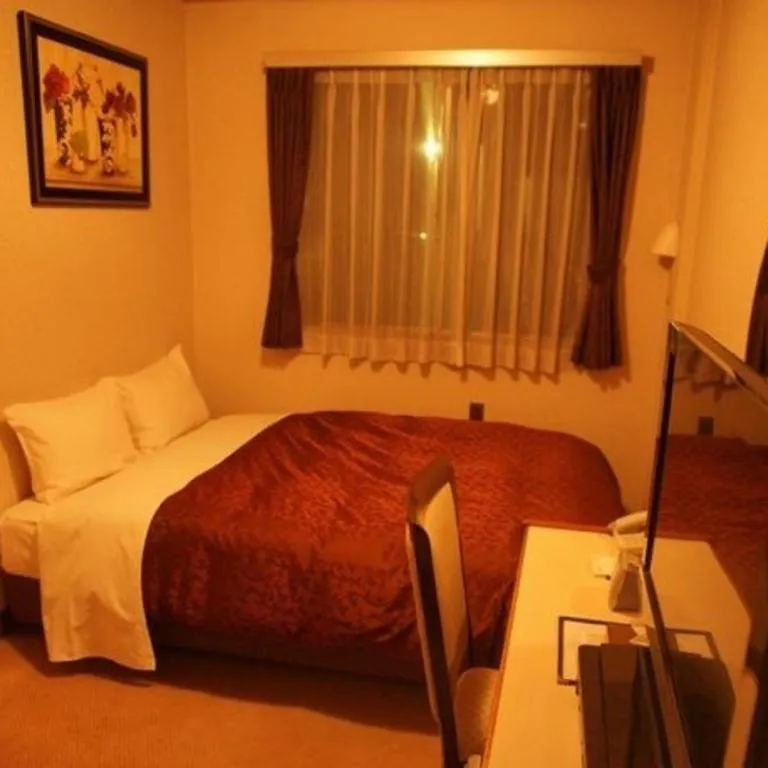 Bed in Hotel Miyoshino Annex