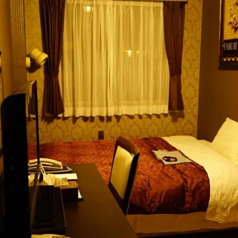 Bed in Hotel Miyoshino Annex