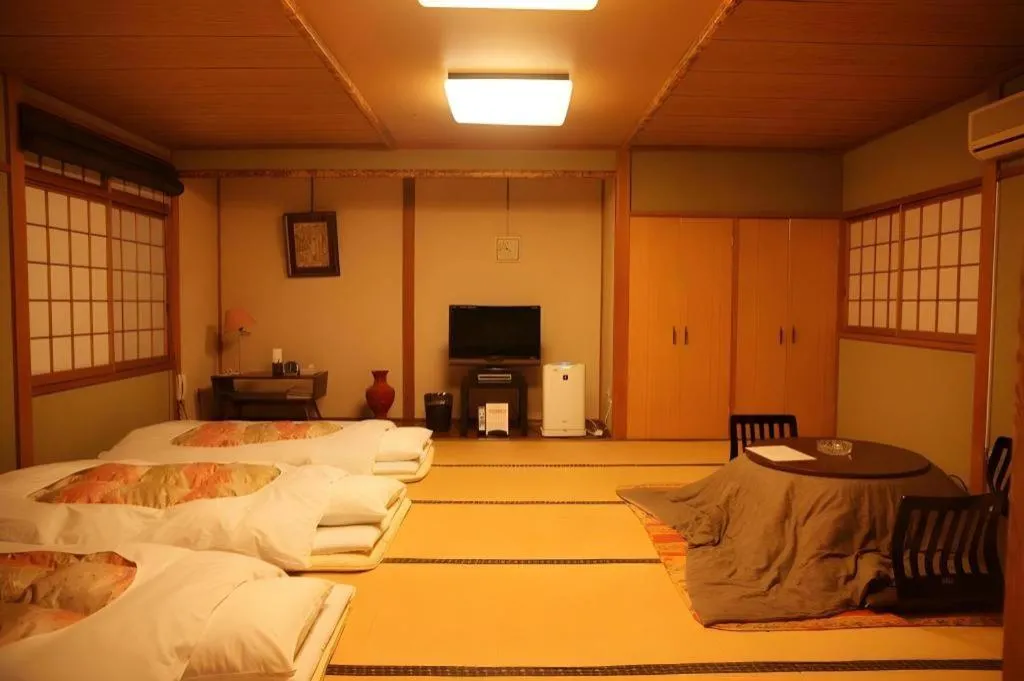 Bed in Hotel Miyoshino Annex