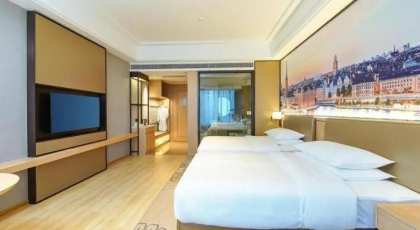 Bed in Venus Royal Hotel Anhui Tongcheng Tongguoxiushui