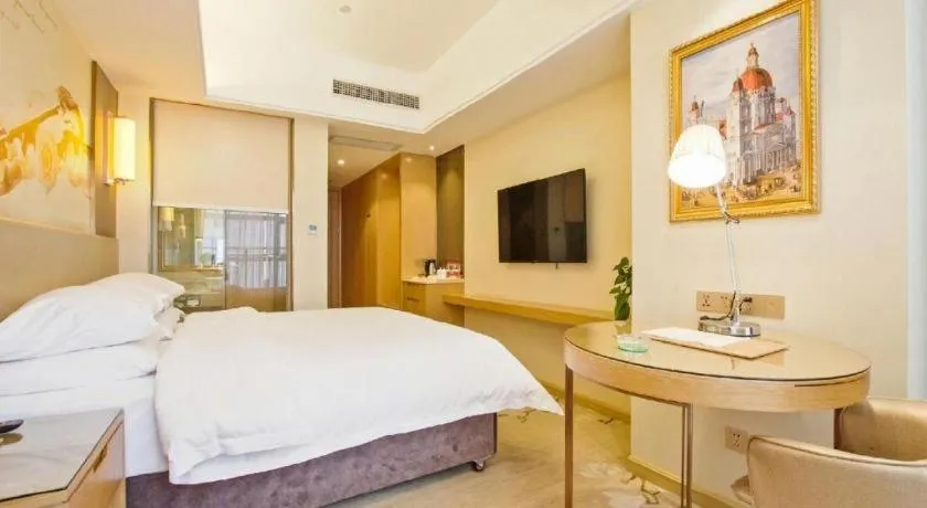 Bed in Vienna Hotel Zhengzhou East High-Speed Railway Station