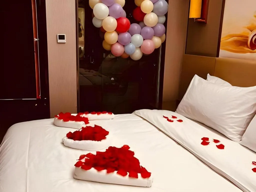 Bed in Vienna Hotel Zhengzhou East High-Speed Railway Station