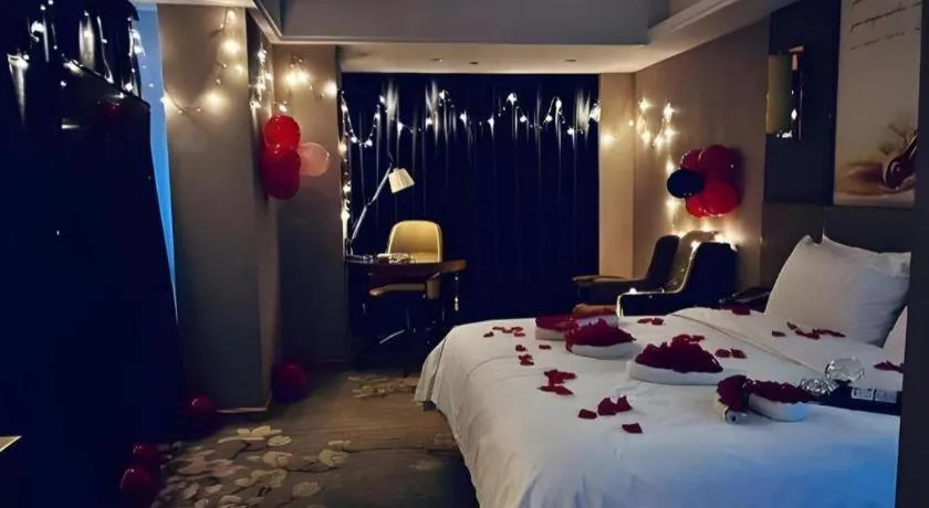 Bed in Vienna Hotel Zhengzhou East High-Speed Railway Station