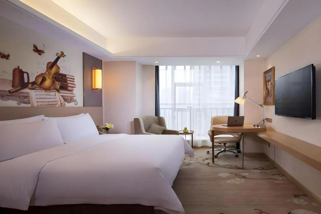 Bed in Vienna Hotel Zhengzhou East High-Speed Railway Station