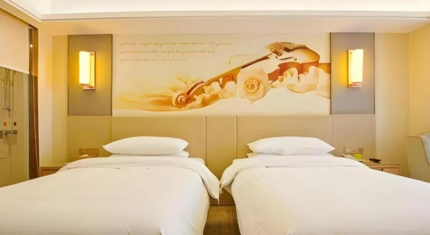 Bed in Vienna Hotel Zhengzhou East High-Speed Railway Station