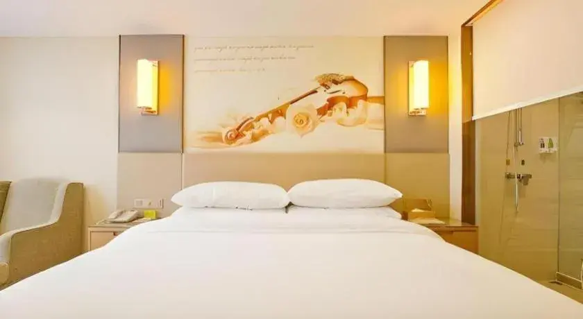 Bed in Vienna Hotel Zhengzhou East High-Speed Railway Station Bed in Vienna Hotel Zhengzhou East High-Speed Railway Station