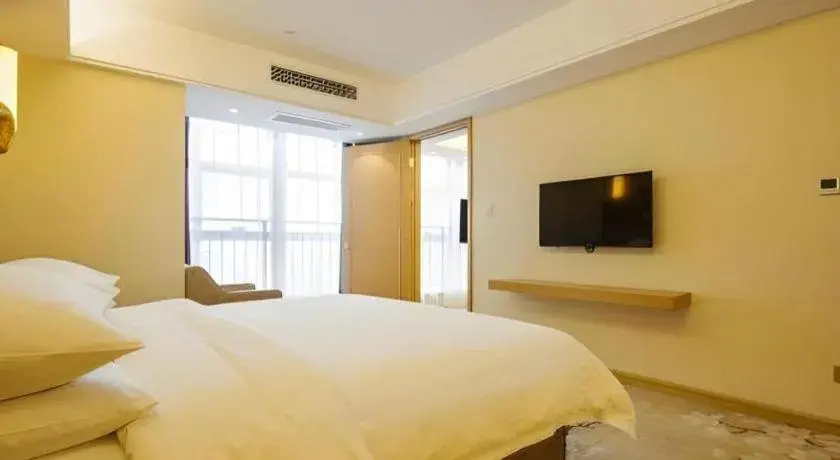 Bed in Vienna Hotel Zhengzhou East High-Speed Railway Station Bed in Vienna Hotel Zhengzhou East High-Speed Railway Station