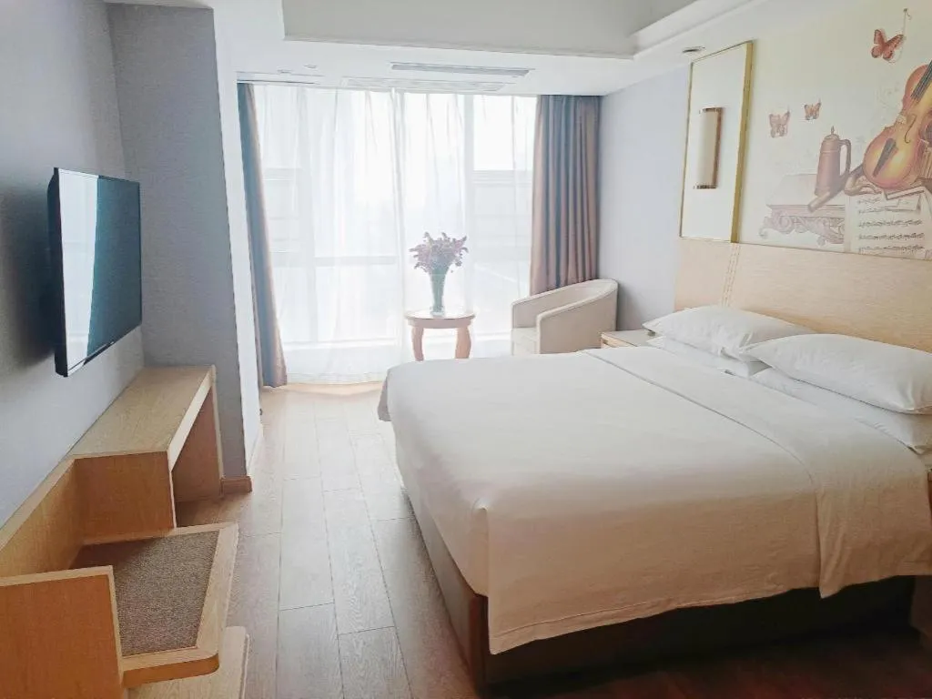 Bed in Vienna Hotel Yueyang East Station