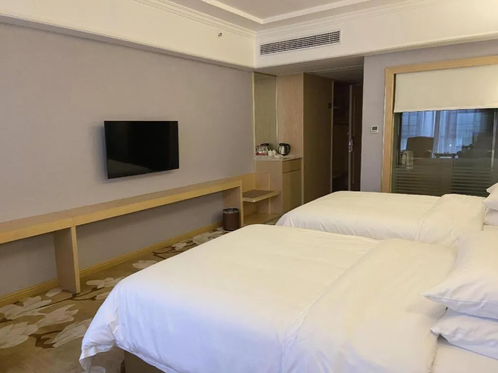 Bed in Vienna Hotel Yueyang East Station