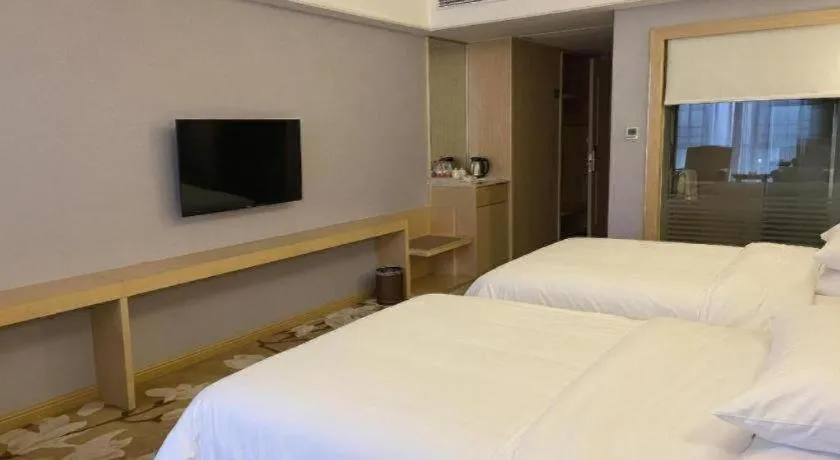 Bed in Vienna Hotel Yueyang East Station